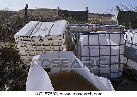 Drawing - Abandoned chemical containers. Fotosearch