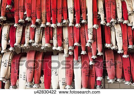 Fire hoses View Large Illustration Drawing - Fire hoses. Fotosearch