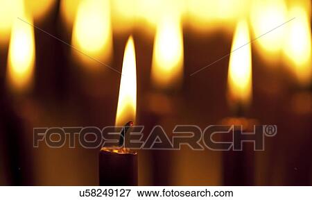 Lit candles View Large Illustration Stock Illustration - Lit candles. Fotosearch