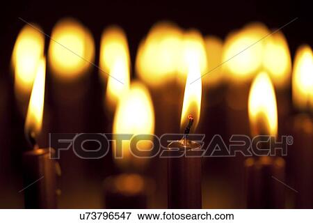 Lit candles View Large Illustration Stock Illustration - Lit candles. Fotosearch