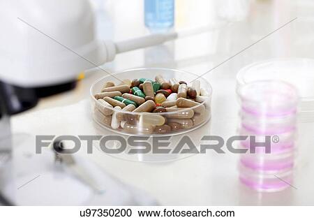 Pharmaceutical research, conceptual image View Large Illustration Clipart - Pharmaceutical research, conceptual image. Fotosearch
