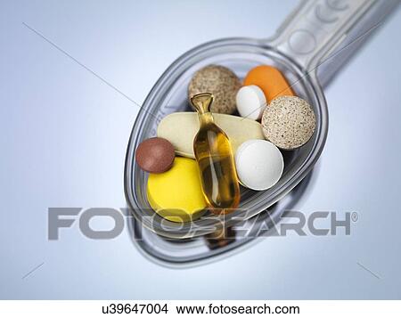 Stock Illustration - Spoonful of supplements. Fotosearch