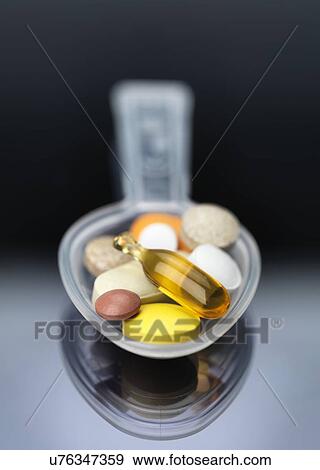 Spoonful of supplements View Large Illustration Stock Illustration - Spoonful of supplements. Fotosearch