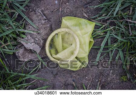 Used condom on ground View Large Illustration Clip Art - Used condom on ground. Fotosearch