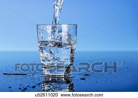 Clipart - Pouring water into a glass. Fotosearch
