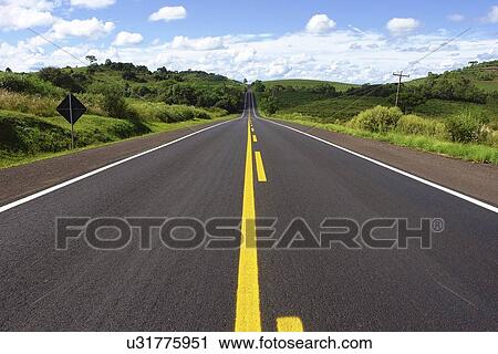 Clip Art - Road through rural landscape. Fotosearch