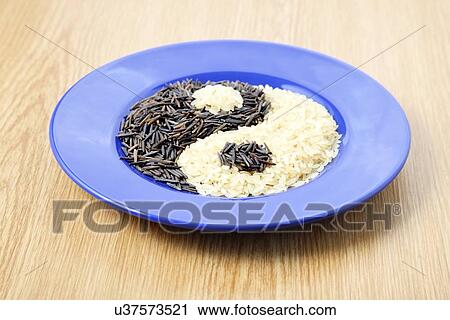 Clip Art - Yin and yang with rice. Fotosearch