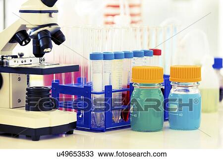 Microscope and chemicals View Large Illustration Drawing - Microscope and chemicals. Fotosearch