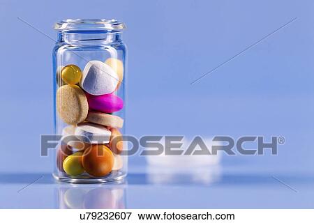 Stock Illustration - Pills in bottle. Fotosearch