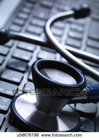 Stock Illustration - Stethoscope on keyboard. Fotosearch
