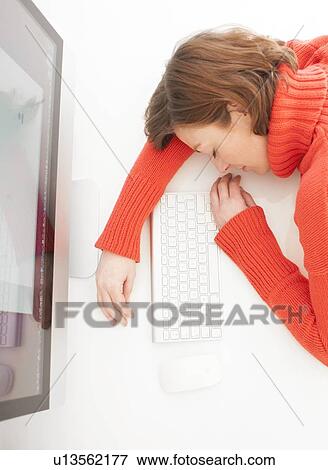 Stock Illustration - Woman asleep on keyboard. Fotosearch