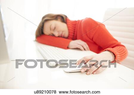 Stock Illustration - Woman asleep on keyboard. Fotosearch