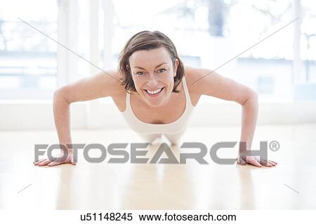 Woman doing press ups View Large Illustration Stock Illustration - Woman doing press ups. Fotosearch
