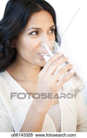 Stock Illustration - Woman drinking water. Fotosearch