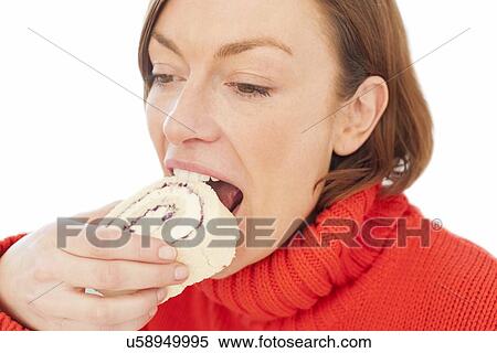 Stock Illustration - Woman eating cake. Fotosearch