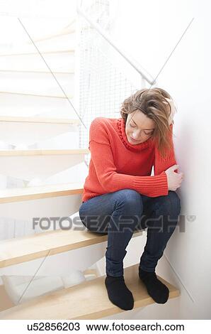 Drawing - Woman on staircase. Fotosearch