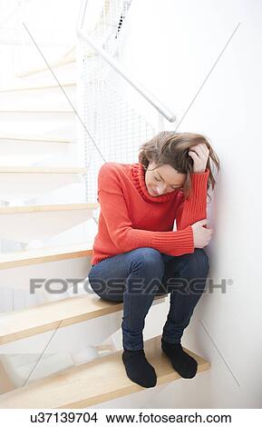 Stock Illustration - Woman on staircase. Fotosearch