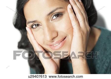 Drawing - Woman touching face. Fotosearch