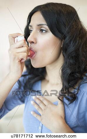 Woman using inhaler View Large Illustration Drawing - Woman using inhaler. Fotosearch
