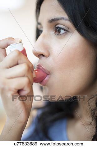 Stock Illustration - Woman using inhaler. Fotosearch