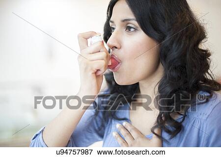 Stock Illustration - Woman using inhaler. Fotosearch
