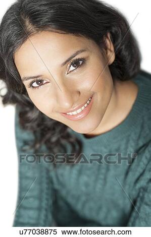 Stock Illustration - Woman wearing green jumper. Fotosearch