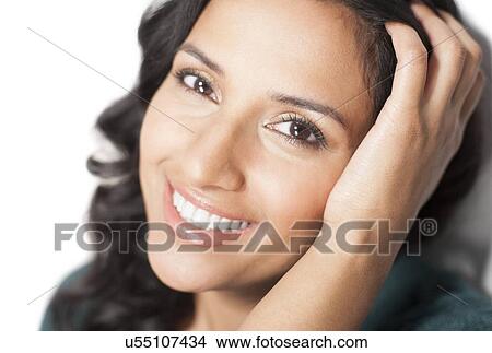 Stock Illustration - Woman with hand in hair. Fotosearch