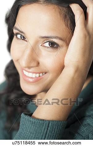 Stock Illustration - Woman with hand in hair. Fotosearch