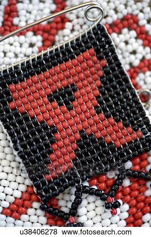 Stock Illustration - Beaded AIDS ribbon. Fotosearch