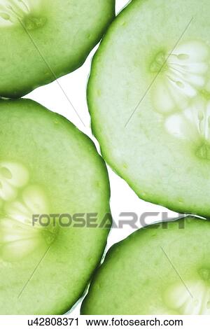 Clip Art - Cucumber slices. Fotosearch