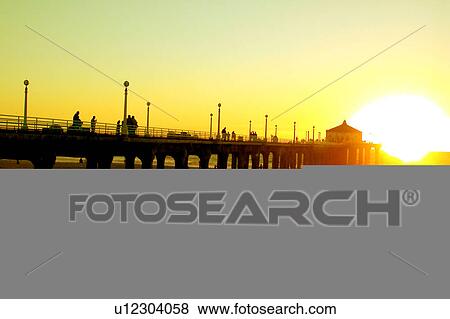 Stock Illustration - Sunset at the pier. Fotosearch