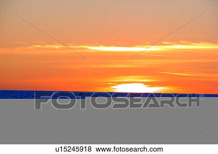 Stock Illustration - Sunset Beach Scene. Fotosearch