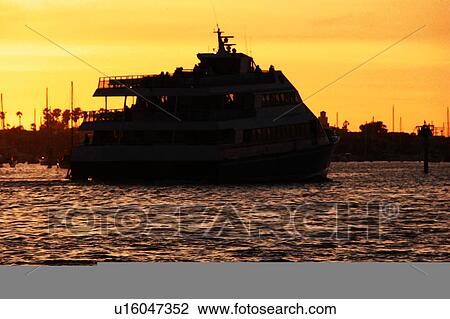 Drawing - silhouttes of boats in ocean. Fotosearch