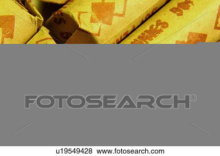 Stock Illustration - rolled up assortment of coins. Fotosearch