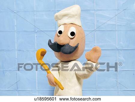 Clip Art - Chef wearing chef's hat and apron holding spoon. Fotosearch