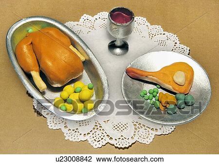 Drawing - Chicken and steak on the dinner table. Fotosearch