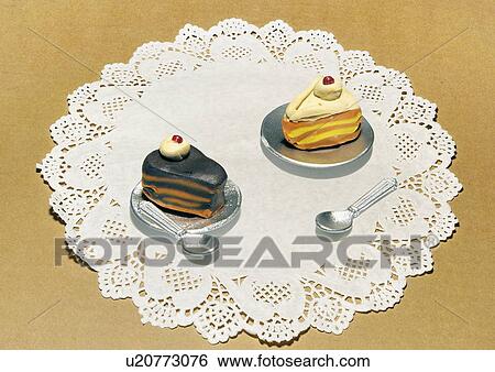 Stock Illustration - Two pieces of cake on plates. Fotosearch