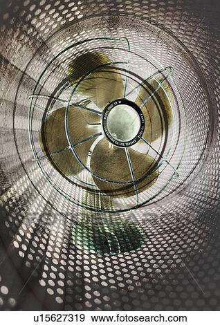 Stock Illustration - Close-up of a fan superimposed on a brown background. Fotosearch