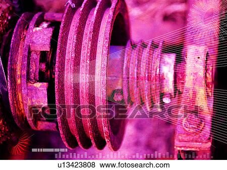 Stock Illustration - Close-up of a metal component superimposed on a pink background. Fotosearch