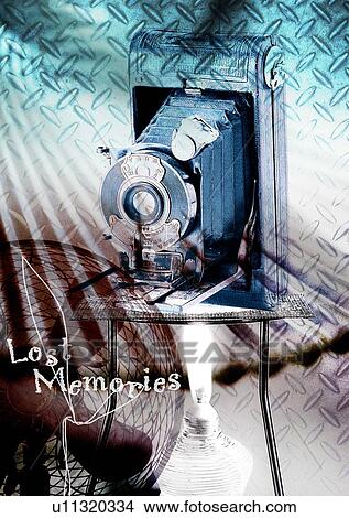 Picture - Camera superimposed on a sheet of diamond plate. Fotosearch