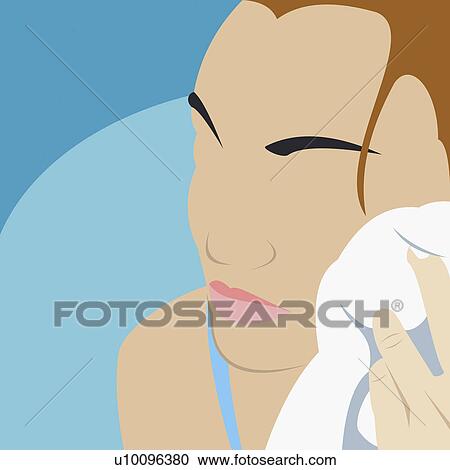 Clipart - Close-up of a young woman wiping her face with a towel. Fotosearch