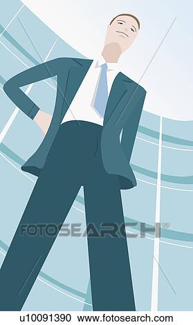 Clipart - Low angle view of a businessman standing with his hand on his hips. Fotosearch