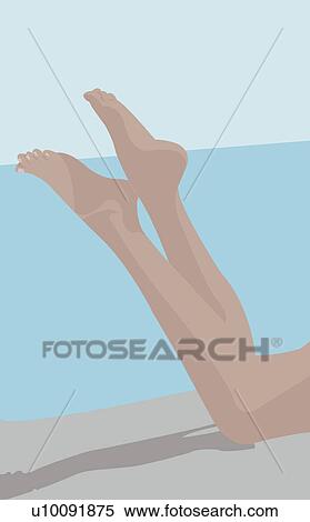 Stock Illustration - Low section view of a woman lying on the beach. Fotosearch