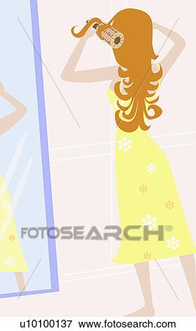 Stock Illustration - Rear view of a young woman combing her hair with a hairbrush. Fotosearch