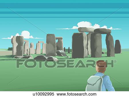 Stock Illustration - Rear view of a young man looking at old ruins, Stone Circle, Salisbury Plain, Stonehenge, England. Fotosearch