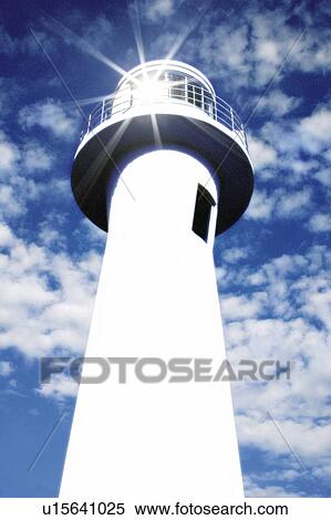 Stock Photography - A lighthouse against the sky, Japan, low angle view, composition, computer graphics, lens flare. Fotosearch