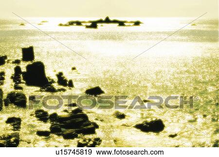 Stock Photo - The shining ocean, Japan, composition, computer graphics, sepia toned. Fotosearch
