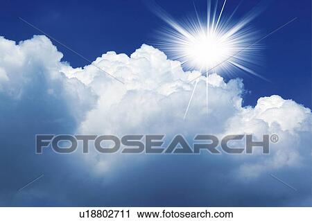 Stock Image - The sun and clouds, Japan, low angle view, composition, computer graphics, lens flare. Fotosearch