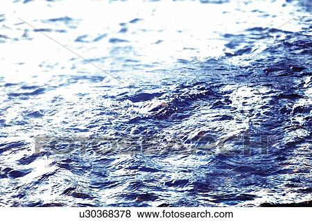 Stock Photo - The surface of the water, Japan, high angle view, composition, computer graphics, full frame. Fotosearch