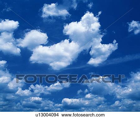 Picture - Blue sky and Clouds, Low angle view, Full frame. Fotosearch